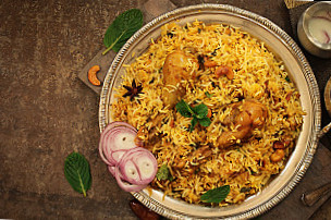 Taj Biryani House And