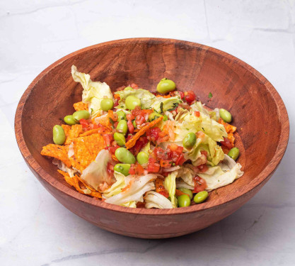 Shredded Ice Berg, Edemame, Crumble Nachos, Tomato Salsa, Coriander, Jalapeno