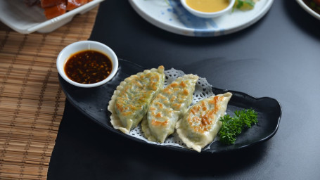 108. Chives Egg Dumplings Jiǔ Cài Hé Zi