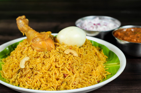 Chicken Dum Biryani Served With Boiled Egg And Onion Raitha)