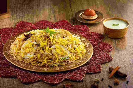 Tokhm E Biryani Classic Egg Dum Biryani Serverer 1)