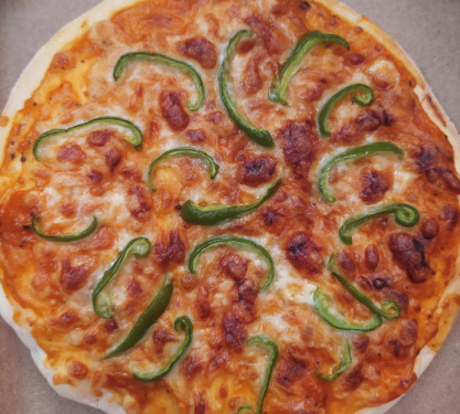 7 Capsicum Pizza With Coke [250 Ml]