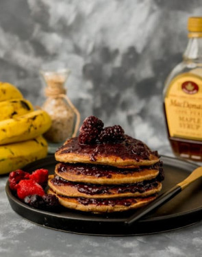 Pancake With Seasonal Fruits And Maple Syrup