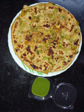 1 Mix Veg Paratha Served With Green Chutney