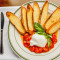 Burrata, Blistered Tomatoes, Garlic Crostini