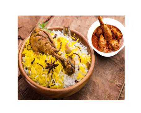 Hyderabadi Chicken Biryani With Leg Piece Raita Free Chicken Curry