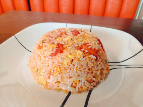 Vegetarian Egg In Buttered Tomato Sauce Fried Rice