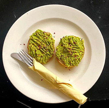 Smashed Avocado Chilli Flakes On A Toasted Muffin