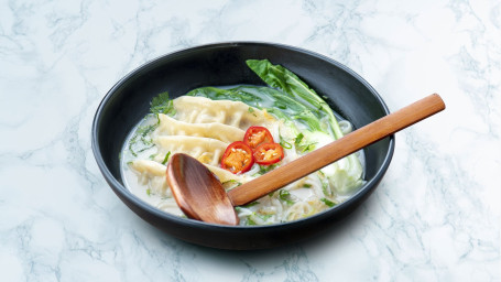 Ramen With Chicken Gyoza And Pak Choi In Savoury White Miso Broth