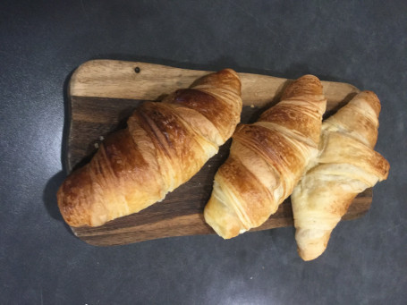 Freshly Baked Croissant With Butter And Jam