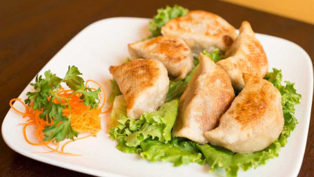 115. Pork Pot Stickers (6)