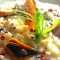 Risotto Cacio E Pepe Alle Cozze Con Fogliette Di Trippa All’arancia